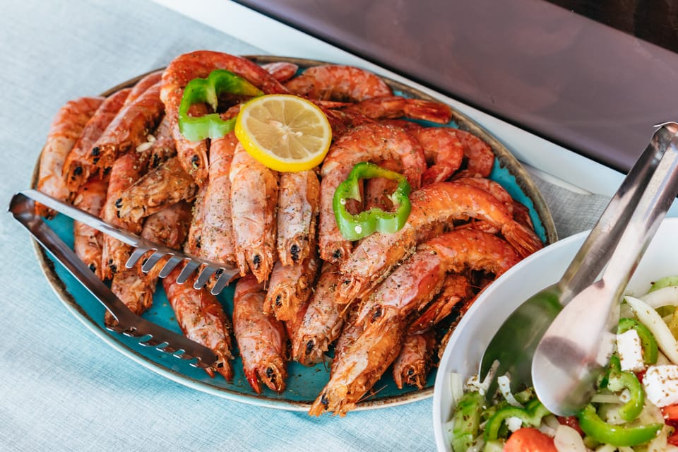 Santorini: Sailing Catamaran Cruise with BBQ and Drinks - Snorkeling Gear, Towels, and a Day That Moves at a Good Pace