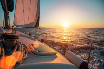 Santorini: Sunset Caldera Cruise with BBQ Meal and Drinks - The Sail Itself: Akrotiri, Beaches, and Caldera Landmarks
