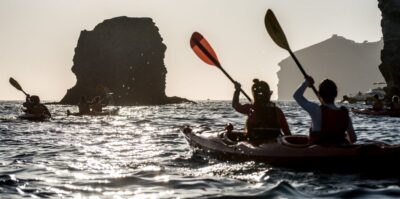 Santorini: Sunset Sea Kayak with Light Dinner - Eastward Past White Beach: Cliffs Look Different From a Kayak