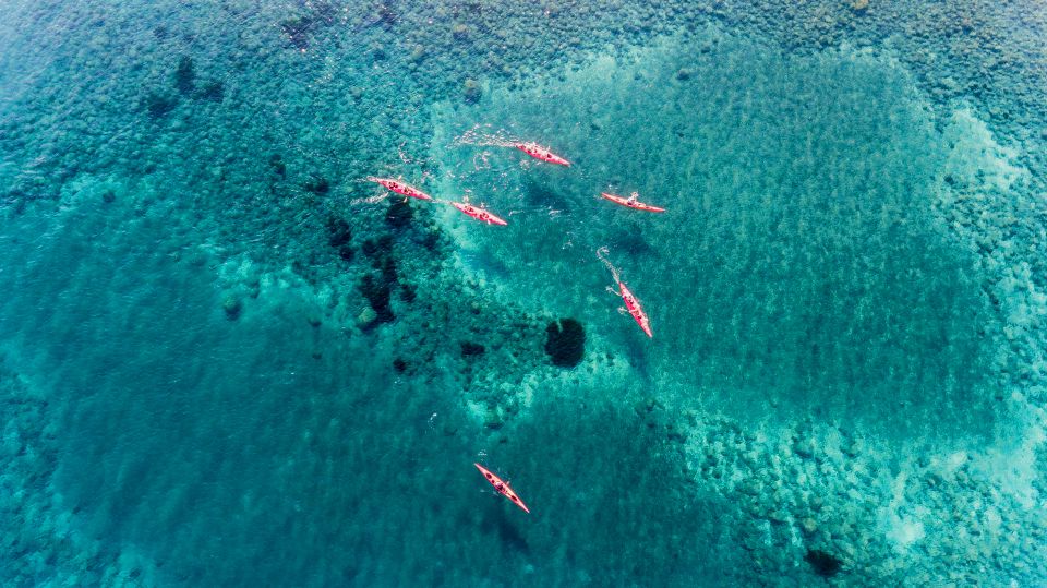 Santorini: Sunset Sea Kayak with Light Dinner - Dry Clothes, Dinner in a Local Taverna, and How the Night Wraps