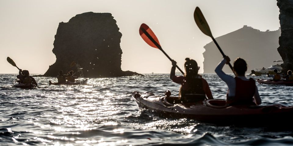 Santorini: Sunset Sea Kayak with Light Dinner - Eastward Past White Beach: Cliffs Look Different From a Kayak