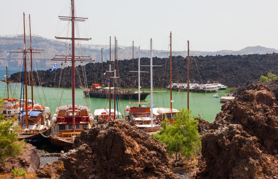 Santorini: Thirassia Islands and Volcano Guided Cruise - Nea Kameni: The lava island hike to the volcano crater