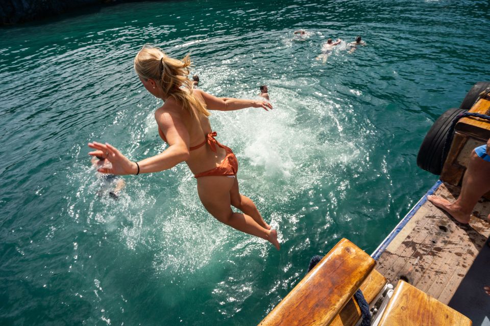 Santorini: Volcanic Islands Cruise with Hot Springs Visit - Santorini Caldera by Wooden Boat: What This Day Feels Like