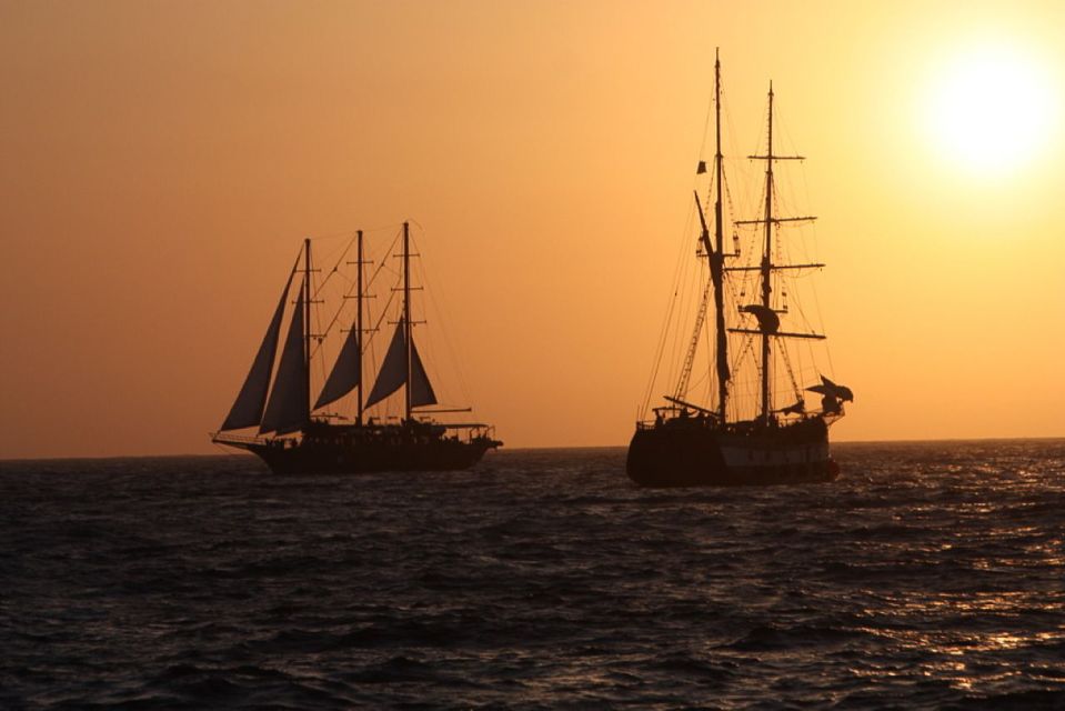 Santorini: Volcanic Sunset Cruise with Dinner - Photo tips that actually work from a moving boat