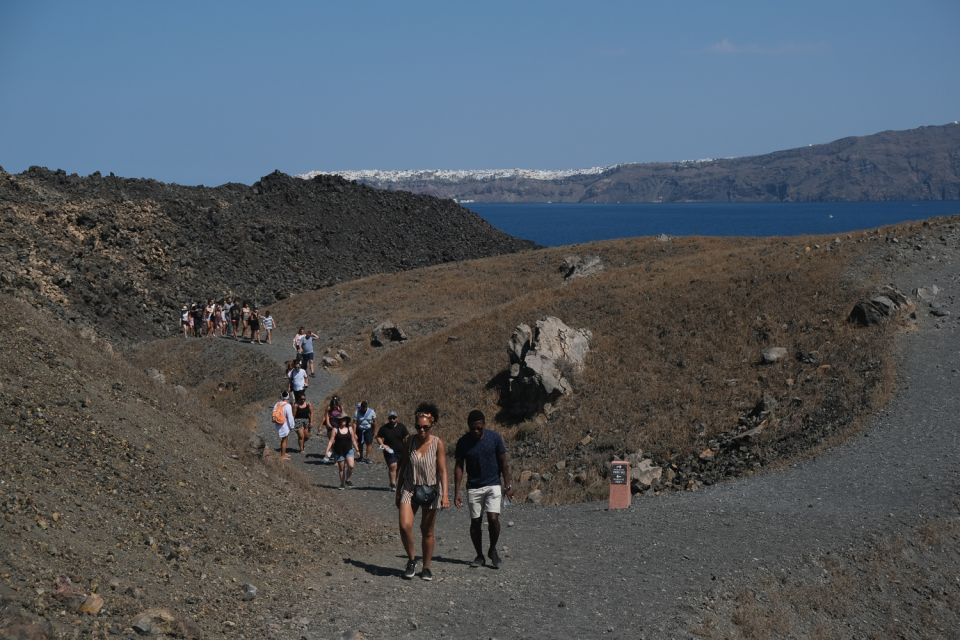 Santorini: Volcano and Hot Springs Sunset Dinner Cruise - Nea Kameni Volcano Hike: Where the Day Really Starts