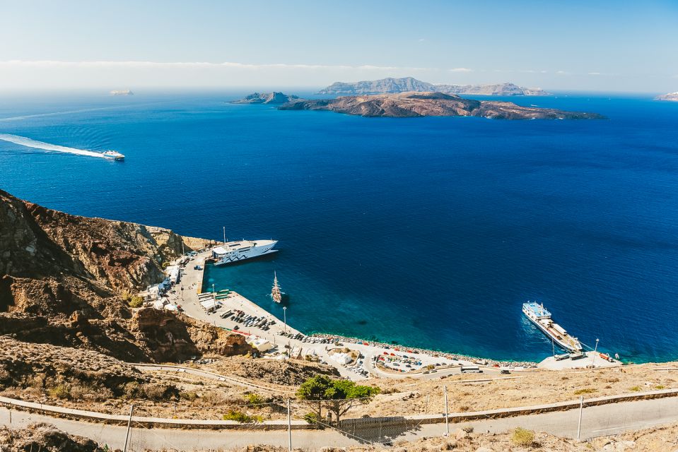 Santorini: Volcano and Hot Springs Sunset Dinner Cruise - Dinner on Board: Buffet Greek Food and Unlimited Local Wine