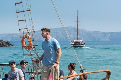Santorini Volcano Sunset Cruise with Dinner - Palea Kameni hot springs: a sulfur swim and mud that ruins swimwear