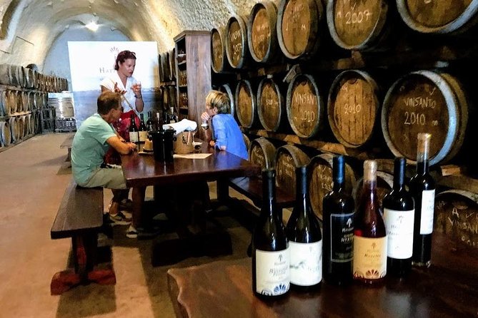 Santorini Wine and Food Experience with pick up included - Perivolos beach taverna: fava, tomato keftedes, and Assyrtiko on black sand