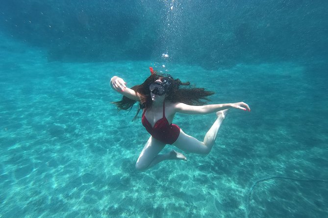 Serenity Kayak : Sea Caves Kayak Trip with Snorkeling & Picnic - White Beach cliff-jump adrenaline, Mesa Pigadia, and the lighthouse