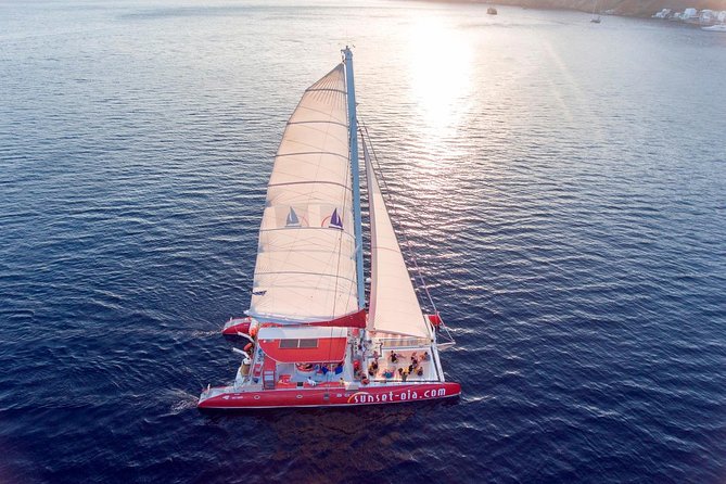 Sunset Sailing Catamaran Cruise in Santorini with BBQ and Drinks - Volcano sailing plus the ancient lighthouse moment