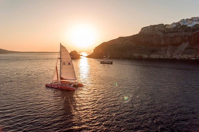 Sunset Sailing Catamaran Cruise in Santorini with BBQ and Drinks - Getting picked up: the real start of your cruise day