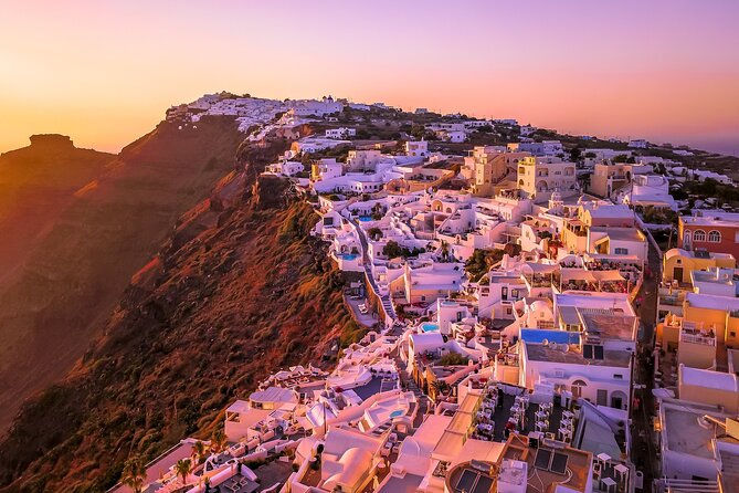 Top Spots Bus Tour in Santorini with Transportation - Stop 6: Oia at sunset with about 1 hour 40 minutes on-site