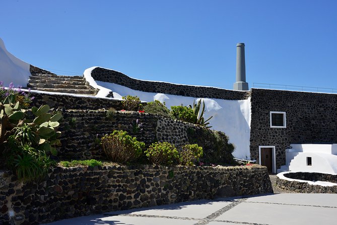 Wine Tour Santorini - Stop 2: Santorini Wine Museum at Koutsogiannopoulos—wine history with a creative twist